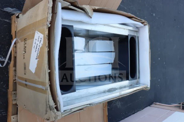 Regency 600IB2136 stainless steel underbar ice bin, 21"x36", with bottle holders, new condition, packaging is ripped.