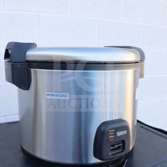 Brand new Galaxy 177RCSGB60 rice cooker, 60 cup capacity, stainless steel, 120V, 1550W. Caution label on exterior.