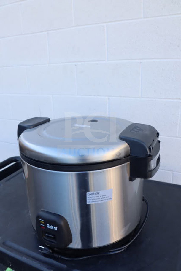 Galaxy 60 Cup Electric Rice Cooker/Warmer, Model 177RCSGB60, 120V, 1550W. Brand new, out of box, with caution label visible.