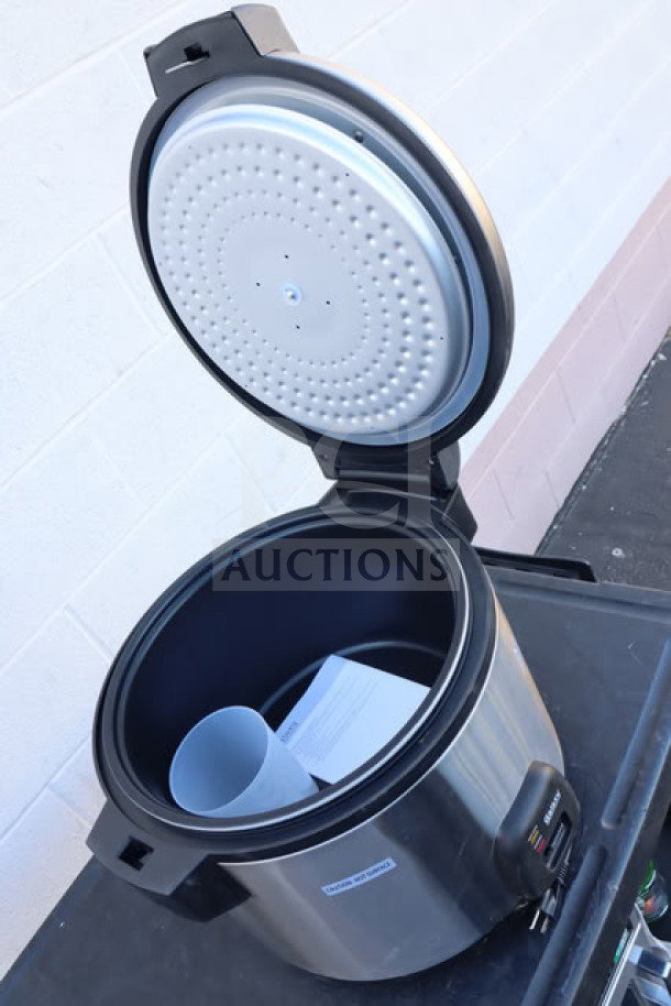 BRAND NEW Galaxy 177RCSGB60 Rice Cooker, 60 Cup, 120V, 1550W, open lid, visible manual and measurement cup, out of box.