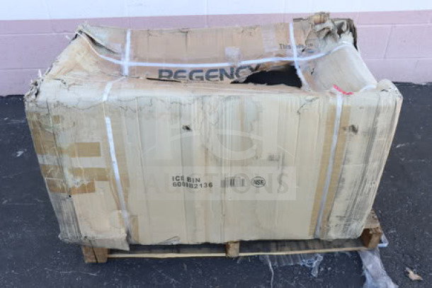 Damaged packaging of Regency 600IB2136, 21"x36" stainless steel underbar ice bin with bottle holders, new in box.