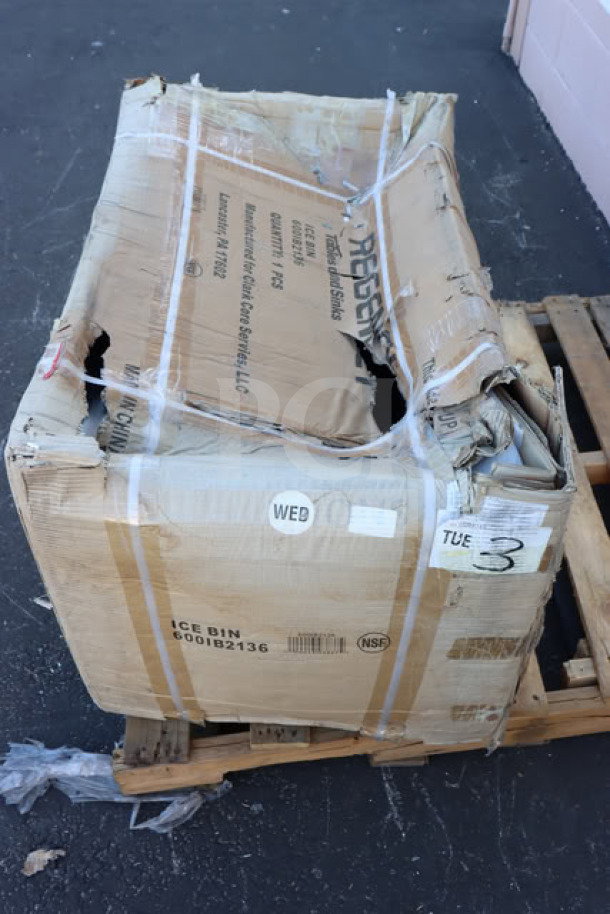 Regency 600IB2136 21" x 36" stainless steel underbar ice bin in damaged packaging. New, with bottle holders.
