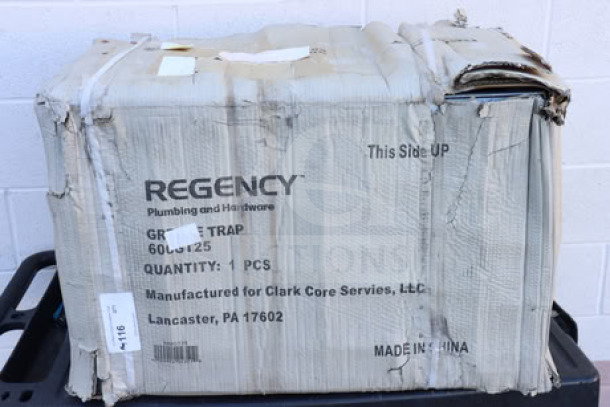 Regency 50 lb. 25 GPM grease trap in damaged packaging; model 600GT25; PDI certified; 3" non-threaded connections.