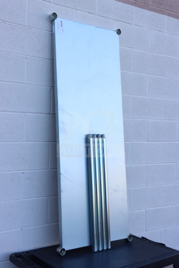 Brand new John Boos GSK8-3072 stainless steel work table surface with four detached legs shown, ready for assembly.