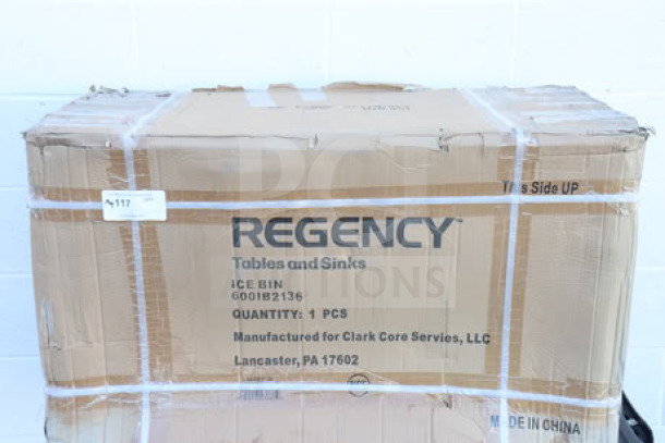Regency 600IB2136 stainless steel underbar ice bin, 21"x36", 119 lb capacity, with bottle holders, in original packaging.