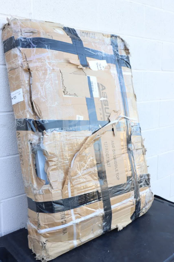 Brand new Add-On 6 Burner Griddle Top, model 177AOGT3627. Dimensions 35 7/8" x 27" x 4". Damaged original packaging.