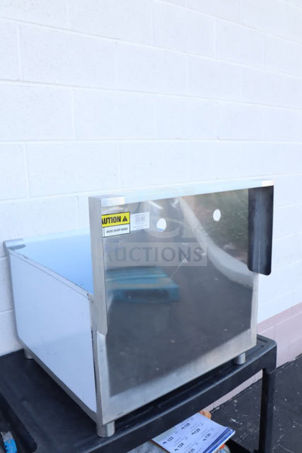 Brand new Steelton 522US12424 24"x24"x14" utility sink, scratch-n-dent, stainless steel, faucet cutouts, caution label visible.