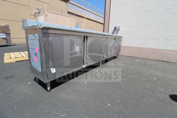 Eagle Group 24" x 120" work table with cabinet base, model CBH24120SE-BS. Scratch-n-dent, new condition, 4.5" backsplash.