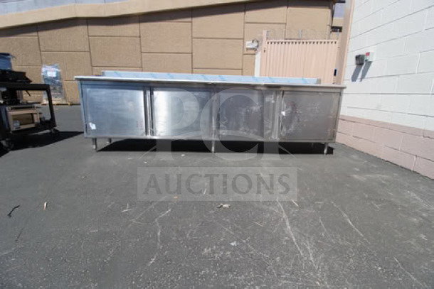 Eagle Group work table, model CBH24120SE-BS, 24" x 120", stainless steel, cabinet base, 4.5" backsplash, scratch-n-dent condition.