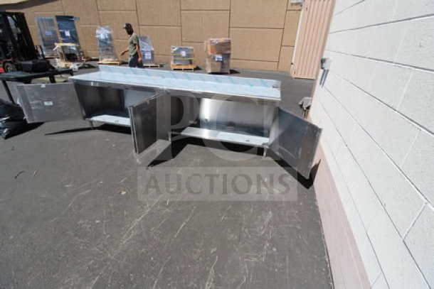 Eagle Group 24" x 120" stainless steel work table with cabinet base, 4.5" backsplash, scratch-n-dent condition. S/N: 2604231710.