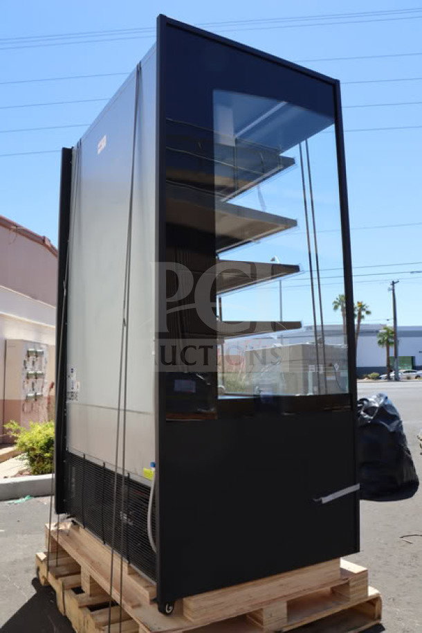 Avantco VOA-48-B black vertical open air merchandiser, 47 3/16", new scratch-n-dent condition, with LED lighting, on pallet.