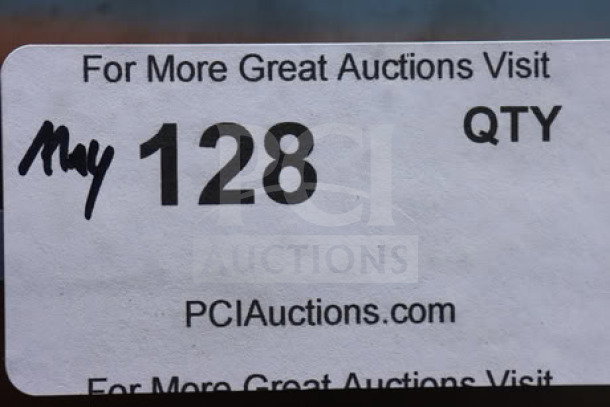 Auction tag showing "128 QTY" with the website PCIauctions.com. Handwritten "May" in black ink.