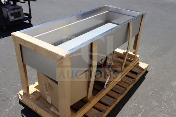 Hatco CWBP-5 five pan refrigerated cold food well, brand new with minor dents, on a pallet, model details visible.