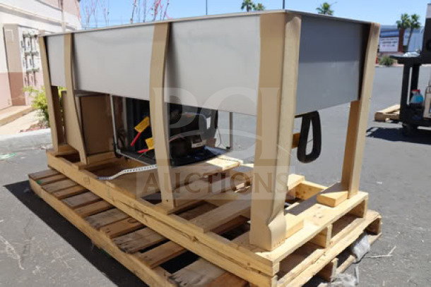 Hatco CWBP-5 five pan drop-in cold food well, brand new with minor dents, on wooden pallet, visible serial number.