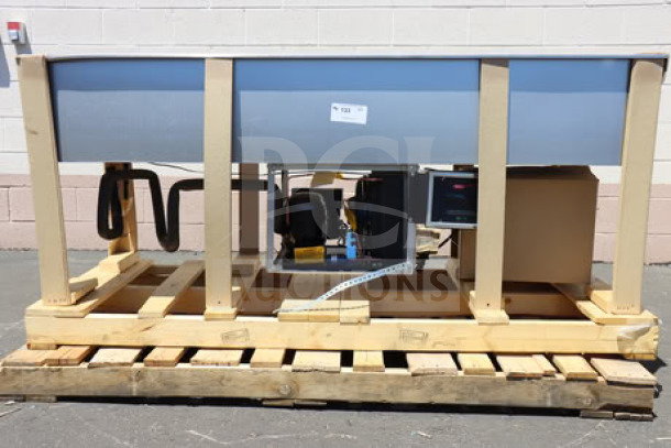 BRAND NEW Hatco CWBP-5 five pan drop-in refrigerated cold food well with drain, minor dents and dings, on a wooden pallet.
