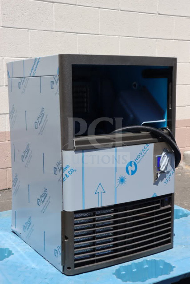 Brand new Manitowoc UDP0080A-161 ice machine, air-cooled, scratch-n-dent, sliding door inside, 31 lb. bin, 115V, 110 lb. capacity.