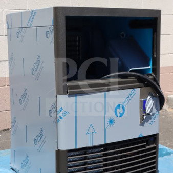 Brand new Manitowoc UDP0080A-161 ice machine, air-cooled, scratch-n-dent, sliding door inside, 31 lb. bin, 115V, 110 lb. capacity.