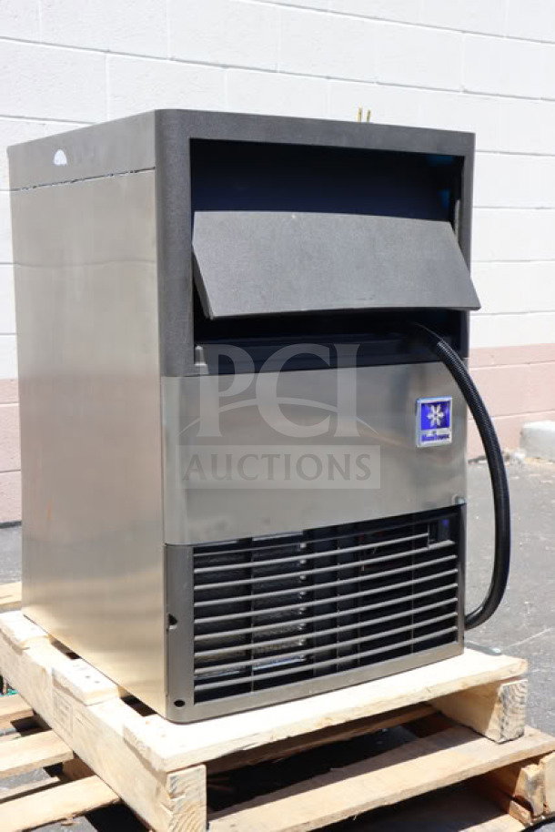 Brand new Manitowoc UDP-0080A ice machine, 19 11/16" wide, air cooled, 31 lb. bin, scratch-n-dent, stainless steel.