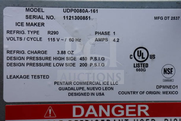 BRAND NEW Scratch-N-Dent Manitowoc UDP-0080A ice machine label, details voltage, refrigerant type, and certifications.