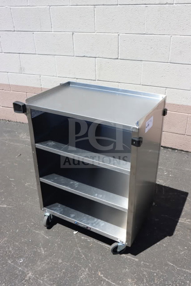 Lakeside 615 stainless steel utility cart with 4 shelves and enclosed base. Minor scratches and dings. 16.5x27.75x32.75 inches.