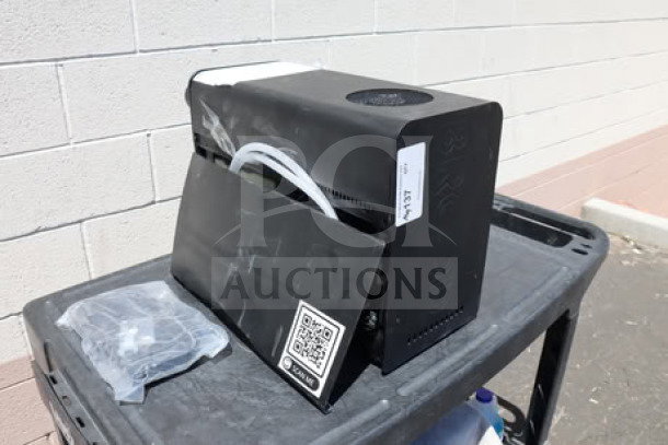 BRAND NEW Fetco DRNX by BROOD DUO Dual Tap Nitro Cold Brew Dispenser, model PBR-DUO SLM, 120V, with visible scratch and dent.