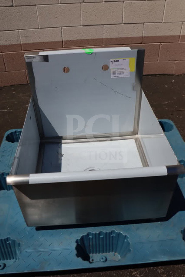 Brand new Regency 600S12424SB utility sink, 24"x24" stainless steel bowl, visible scratches, commercial use.