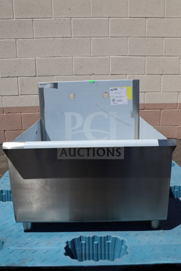 Brand new Regency 600S12424SB 24" utility sink, stainless steel, one compartment, slight scratches, visible labels.