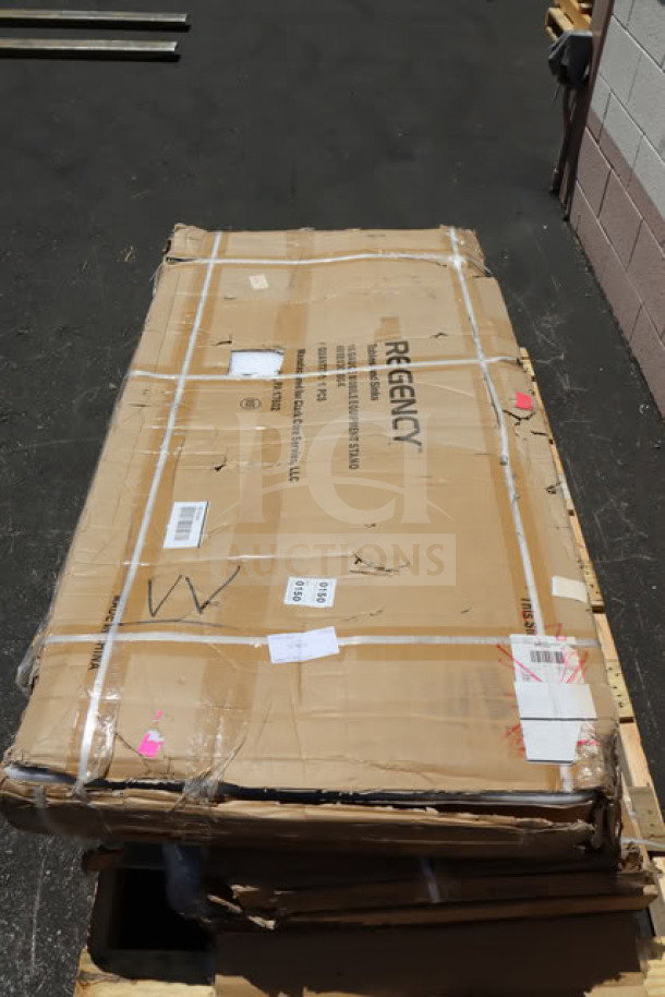 Regency 600ES3060GK stainless steel equipment stand in damaged packaging, new condition, may have missing pieces.