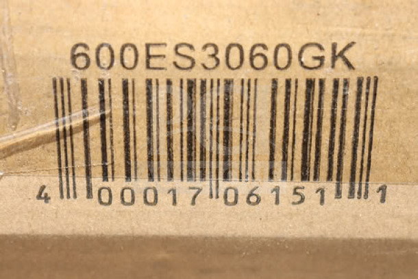 Bar code label showing model number "600ES3060GK" for Regency equipment stand. Original packaging damaged.