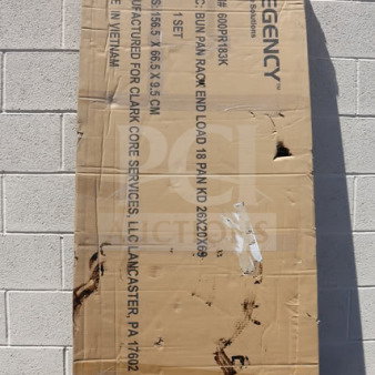 Brand new Regency 18 Pan End Load Bun/Sheet Pan Rack, model 600PR183K, unassembled, in original packaging with residue.