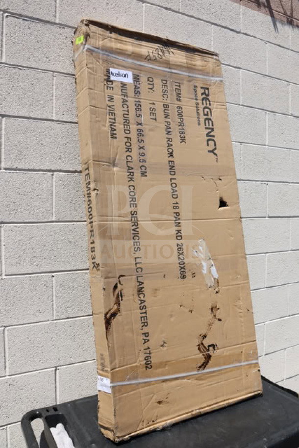 Unassembled Regency 18 Pan End Load Bun/Sheet Pan Rack, Model 600PR183K, in original packaging with residue.