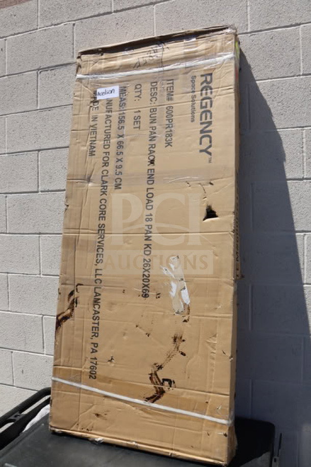 Regency 18 Pan End Load Bun/Sheet Pan Rack, Model 600PR183K, unassembled in packaging. Packing has residue.