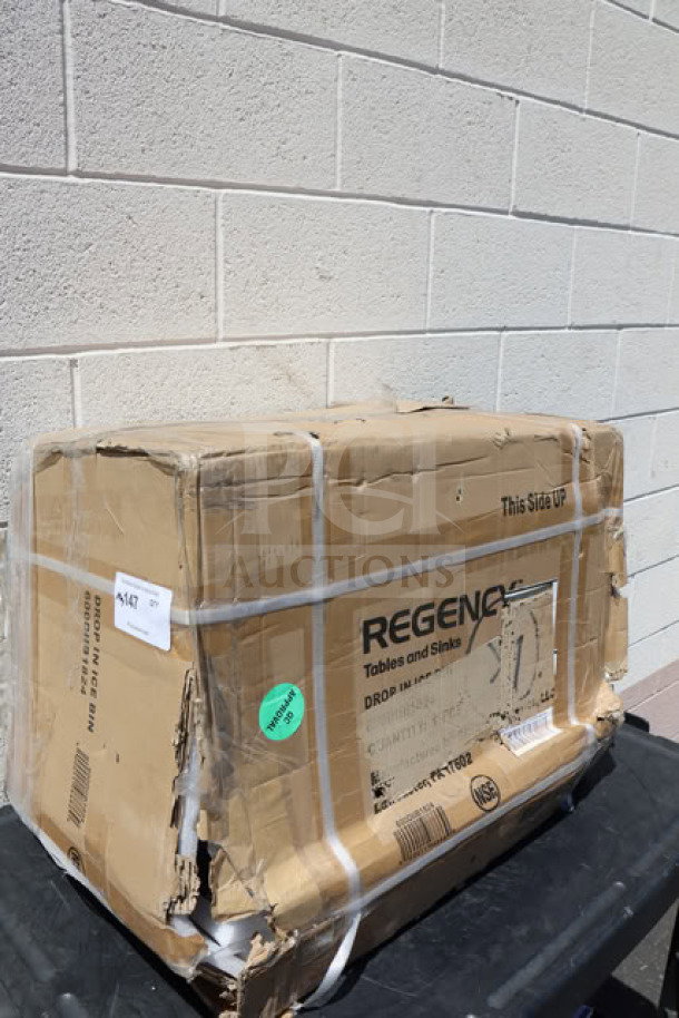 Regency 18" x 24" Stainless Steel Drop-In Ice Bin with Sliding Lid, model 600DIIB1824, in damaged original packaging.
