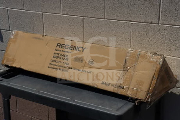 Regency 600PS1248 stainless steel pot rack with shelf and 18 hooks, in original box; box is ripped.