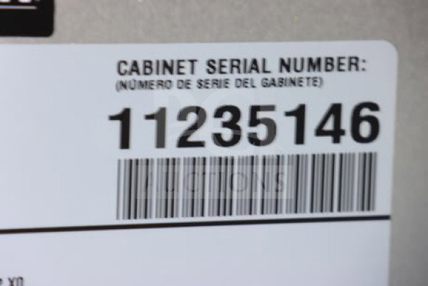 Barcode and serial number label for True TSSU-60-16-HC refrigerated prep table, S/N: 11235146.