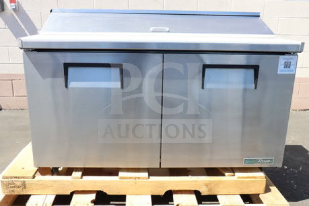 Brand new True TSSU-60-16-HC refrigerated sandwich prep table, 60 3/8", two-door, stainless steel, tested, powers on.