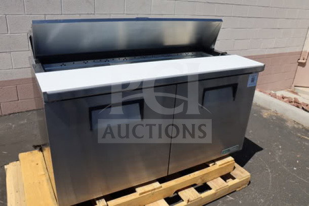 True TSSU-60-16-HC 2-door refrigerated sandwich prep table, brand new with scratches and dents, powered on, 115V.