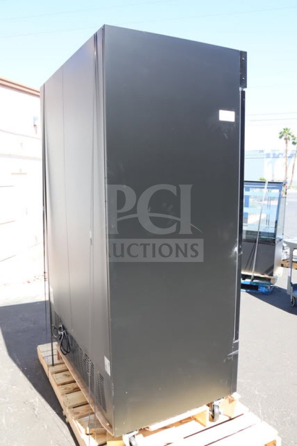 Brand new Avantco GDC-49-HC 53" black merchandiser refrigerator with glass door damage, LED lighting, on pallet.