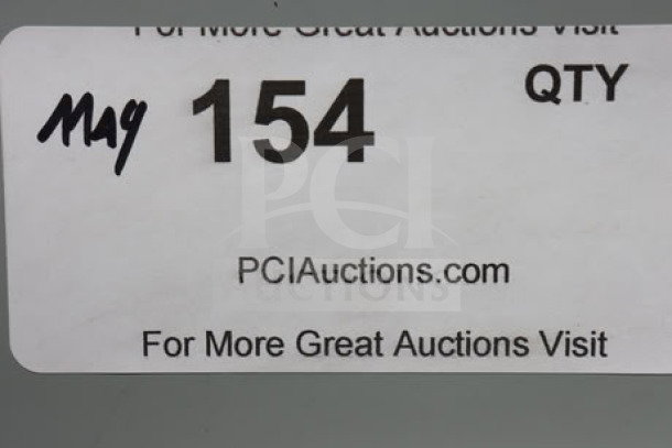 Sticker displaying "Mag 154 QTY" and "PCIAuctions.com" with additional auction info.