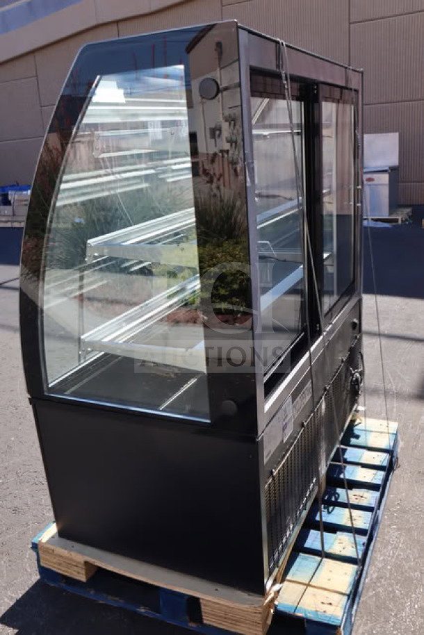 Avantco BCTD-48 bakery display case, black, 3 shelves, curved glass, LED lighting, new scratch-and-dent, 115V, 0.3A, 1 Phase.