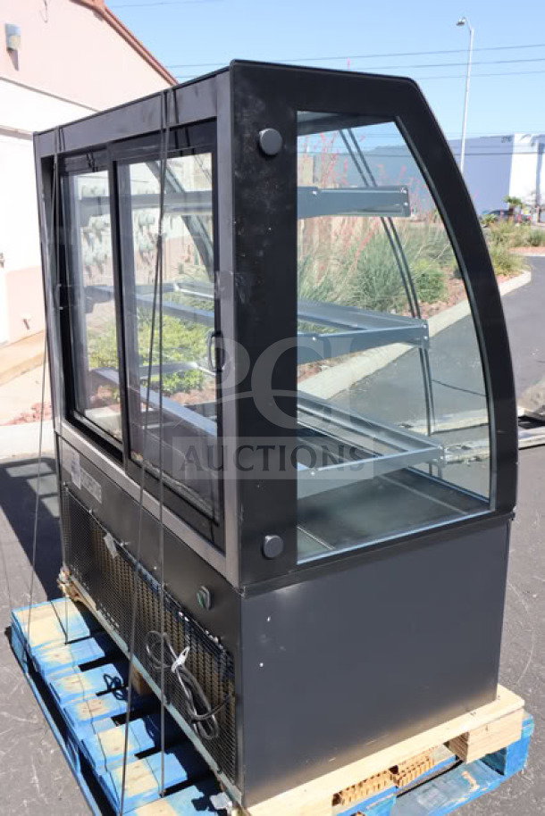 Brand new Avantco BCTD-48 48" curved glass bakery display case, black, 3 shelves, LED lighting, minor scratches.