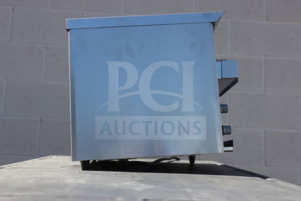 Vollrath CT2BH-120400 JT1BH conveyor toaster, stainless steel, 2 1/2" opening, 120V, 1600W, new condition, side view.