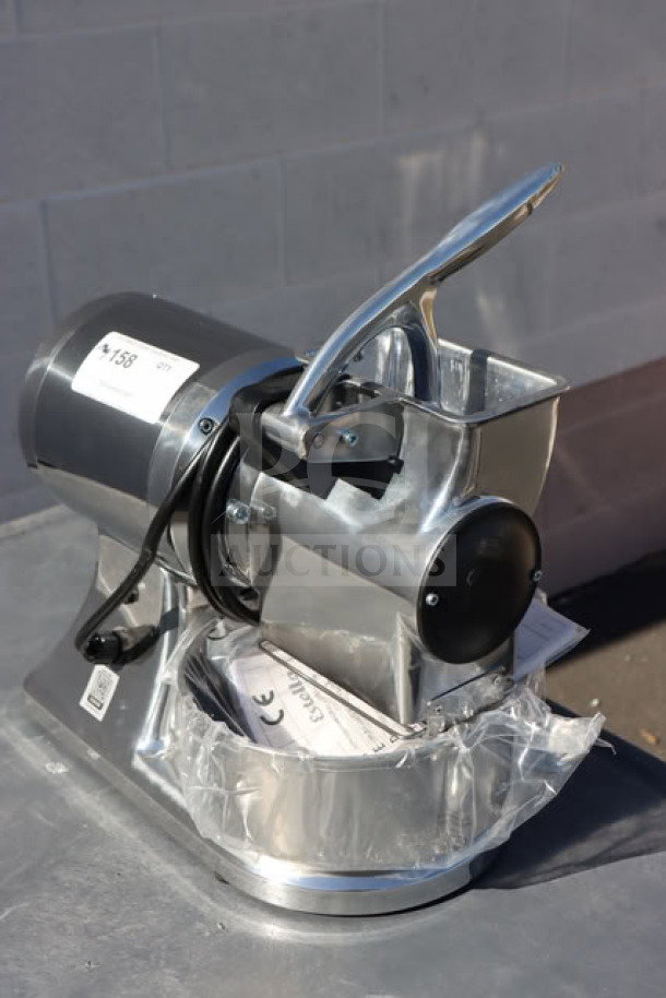 Brand new Estella CG112NB electric hard cheese grater, 110V, 1 1/2 hp. Scratch-N-Dent model, 3.3 lb/min capacity. S/N: 2514330.