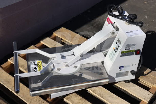 Brand new Estella DPC1620T 16"x20" dual-heat tortilla dough press on pallet. 240V, 3600W, out-of-box, serial 348DPC1620T052300214.