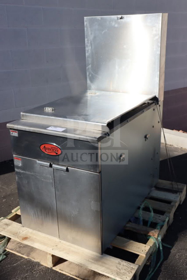 Brand new Estella DPC1620T dual-heat clamshell tortilla dough press, 16"x20", 240V, 3600W, on pallet, minor dents.