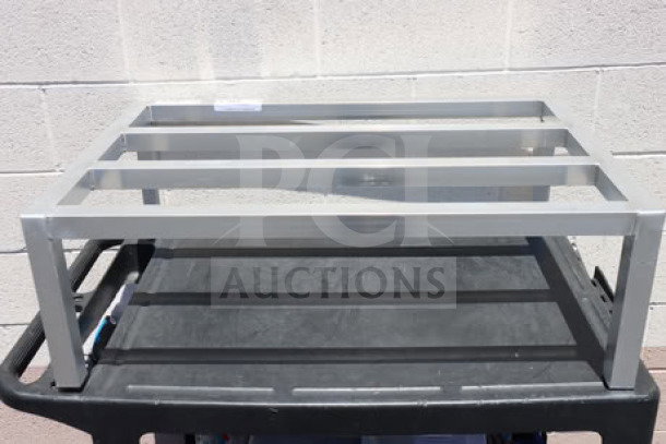 Regency 600DUN244812 aluminum dunnage rack, 48"x24"x12", 1780 lb. capacity, new condition, minor scuffs visible.