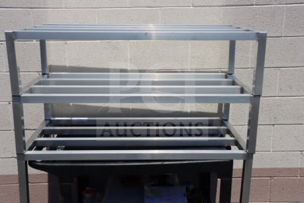 3 brand new Regency 600DUN244812 aluminum dunnage racks, 48"x24"x12", 1780 lb capacity, minor scuffing/scratches.