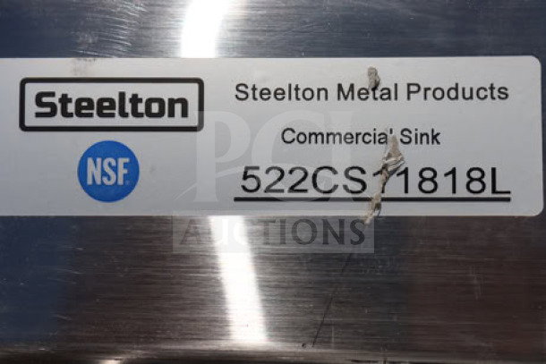 Steelton 522CS11818L commercial sink label, NSF certified, model and brand info visible, marked as scratch-and-dent.