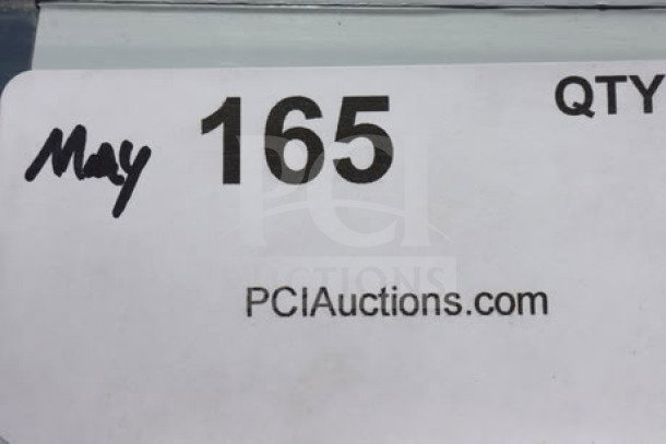 Brand new scratch-n-dent Steelton 522CS11818L commercial sink, 38 3/4" with 18" left drainboard, auction tag for PCIauctions.com visible.