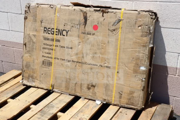 Brand new Regency 600TS3048S 30"x48" 16-gauge 304 stainless steel work table with undershelf; packaging damaged.